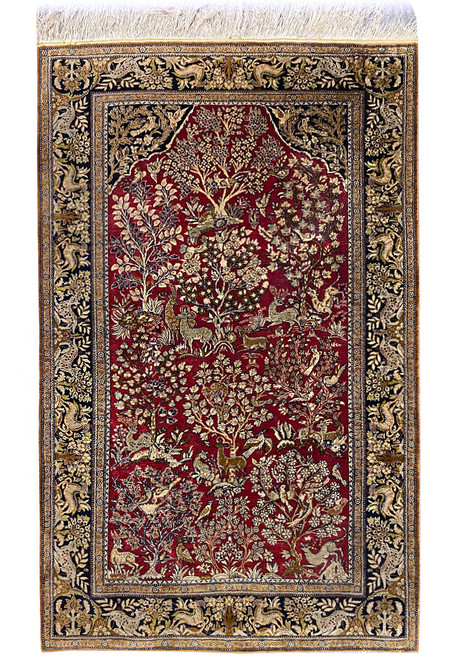 Full view of 3'6" x 5'4" Persian Qum silk rug with ruby red Tree of Life field