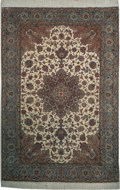 Ivory field Persian Tabriz rug with sea green border and brown floral medallion, wool and silk