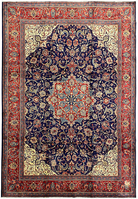 Navy blue 10x13 Persian Isfahan rug with red floral medallion and ivory corner spandrels