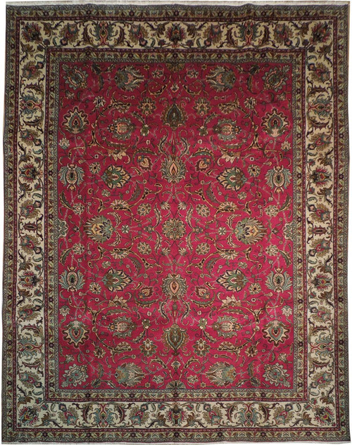 Full view of 10x12 Persian Tabriz rug, raspberry red field with ivory floral palmette border