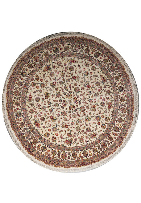 Overhead view of round ivory wool and silk Oriental rug with dense all-over floral field
