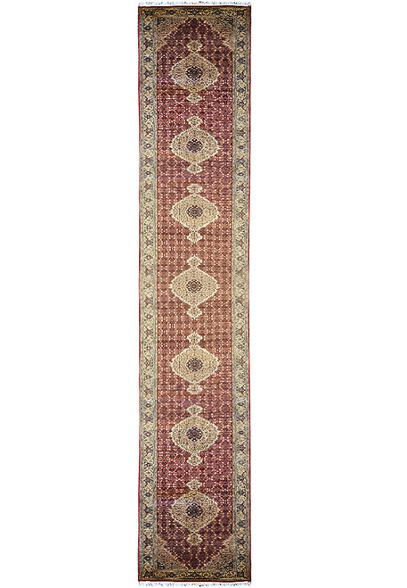 Full length 2'7" x 21'2" wool and silk runner with repeating ivory Mahi medallions on red field