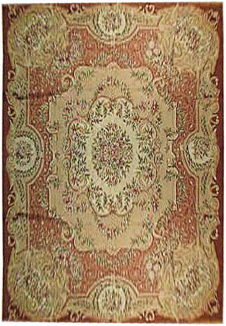 Faded scanned overview of ecru and rust French needlepoint rug showing central floral medallion and border