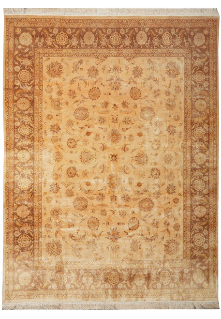 Full overhead view of the beige and gold Ziegler rug with its wide brown floral border