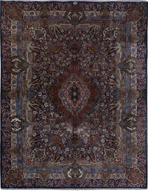 9'10" x 16'1" Persian Kashmar rug with navy blue allover field and rose floral borders