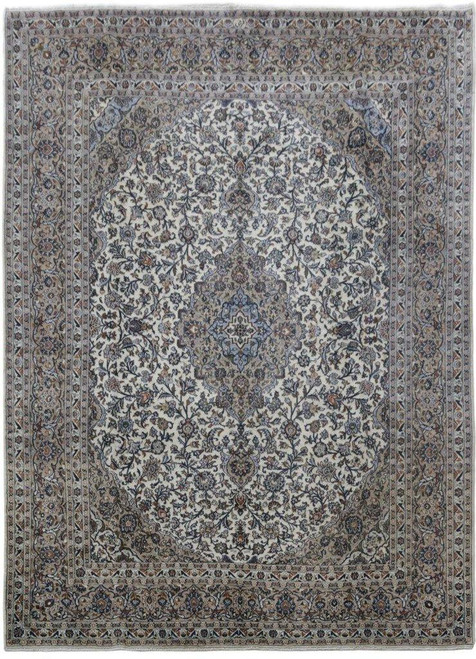 Ivory field Persian Kashan rug with blue floral medallion and taupe multi-band border, overhead view