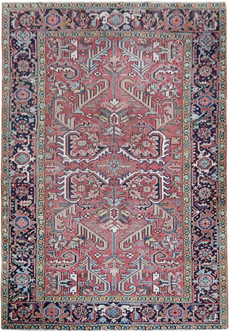 Antique Persian Heriz rug with rose red field, navy border and all over geometric palmette design