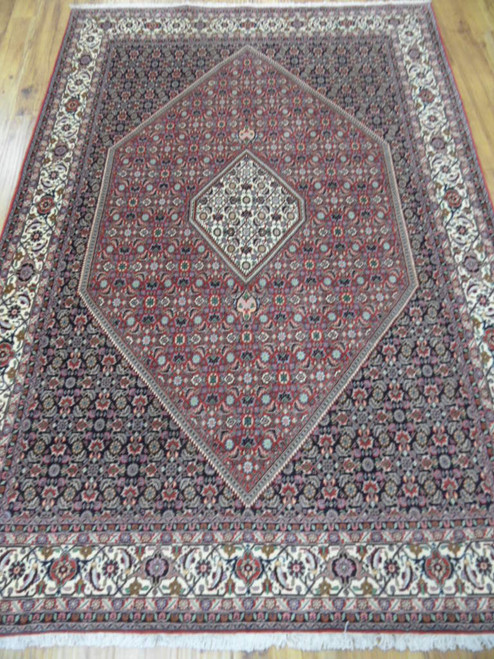 Navy and soft red Persian Bijar rug with Herati fish pattern and ivory palmette border