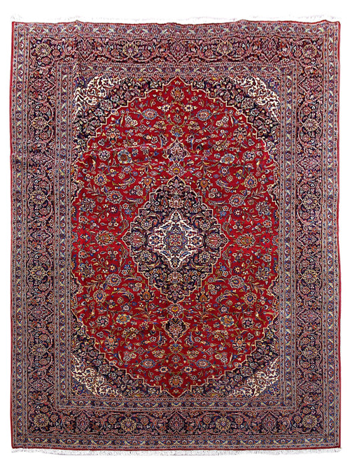 9'10" x 13'2" Persian Kashan rug with navy medallion centered on a deep red floral field
