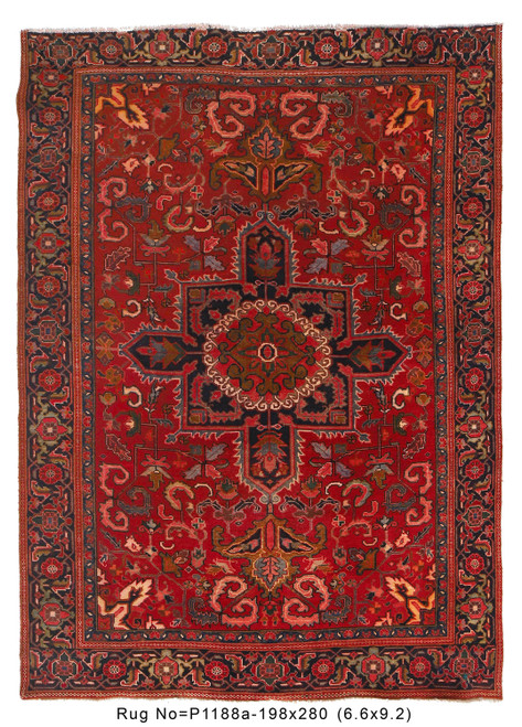 Full overhead view of 6'6" x 9'2" Persian Heriz rug with red field and navy medallion