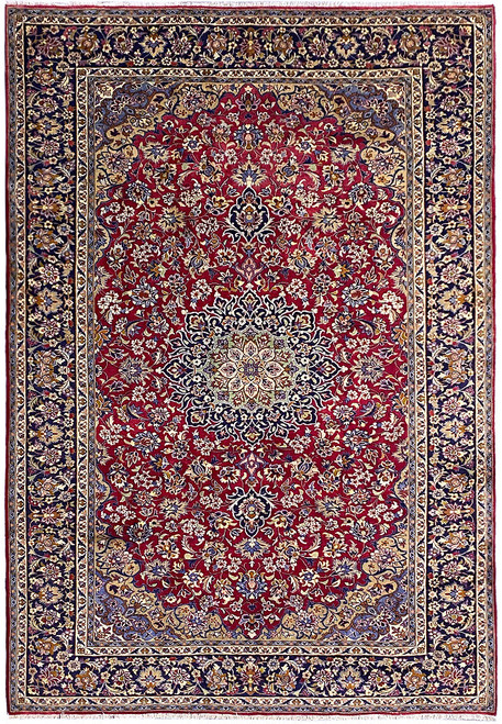 Full overhead view of 8'5 x 12'3 Persian Kashan rug with red field and navy border