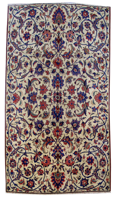 6'11" x 12'6" Persian Isfahan rug with ivory field and blue red allover floral vines