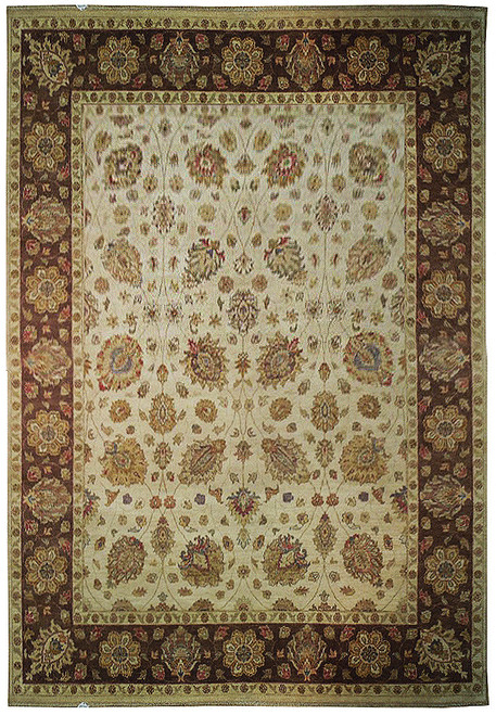 Ivory Chobi rug with dark brown floral border and all-over palmette vines, full overhead view