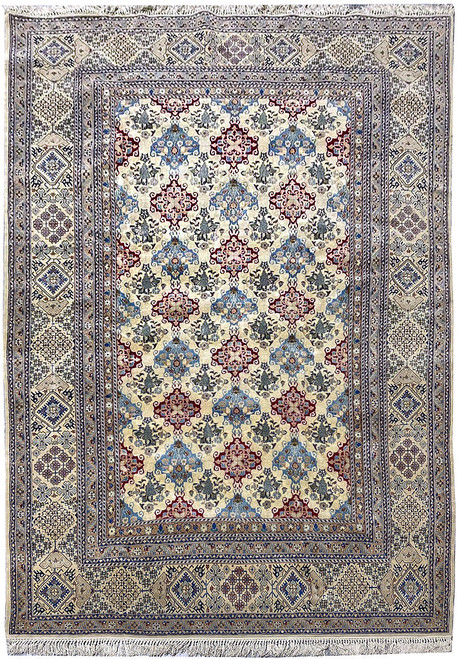 Full overhead view of Persian Nain rug with ivory field, blue lattice and burgundy medallions