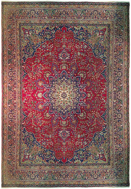 Red Persian Tabriz rug with ivory star medallion, eggplant purple surround and navy floral border