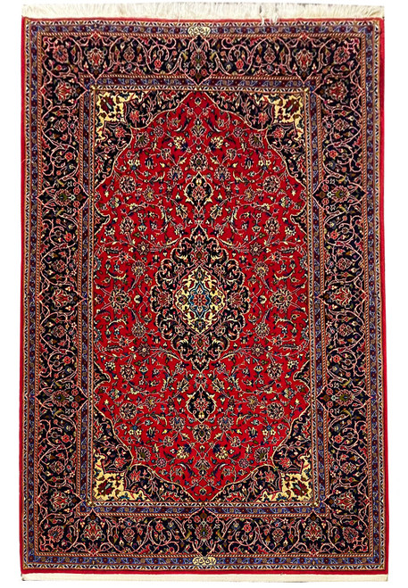 Full view of 4'8" x 7'6" Persian Kashan rug with red field and navy floral border