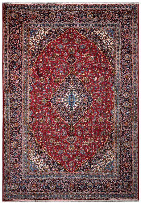 Deep red Persian Kashan rug with navy lobed medallion, ivory spandrels and indigo floral border