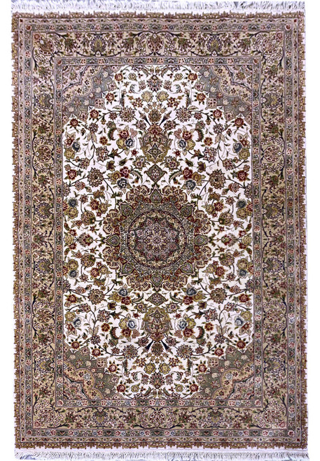Full overhead view of ivory 6 x 9 Sino Tabriz rug with round floral medallion