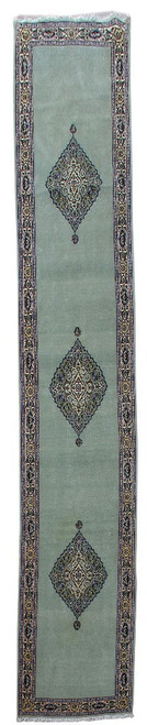 Full view of baby green Persian Kashan runner with three teal diamond medallions and ivory border