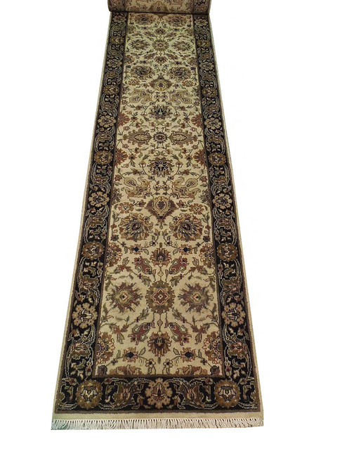 2'6" x 21'8" ivory Chobi runner rug from India shown full length, far end rolled