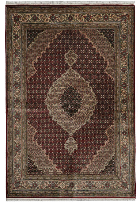 Black field Tabriz Mahi rug with ivory lobed medallion and sage floral border, full view