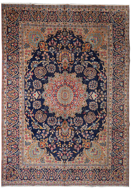 Navy blue 9' x 12' Persian Kerman rug with coral medallion and ivory floral borders