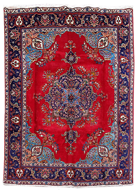 Red open field Persian Tabriz rug with navy floral medallion and sky blue corner spandrels