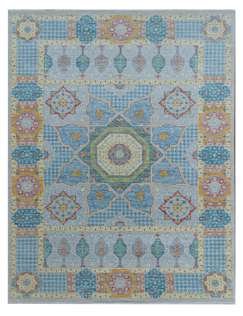 Overhead view of 10'1 x 14'1 turquoise Oushak Mamluk rug with green octagon medallion