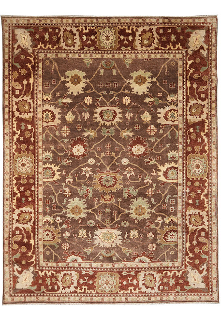 Brown field 9x12 Jaipur Oriental rug with rust border and ivory floral rosettes, full view