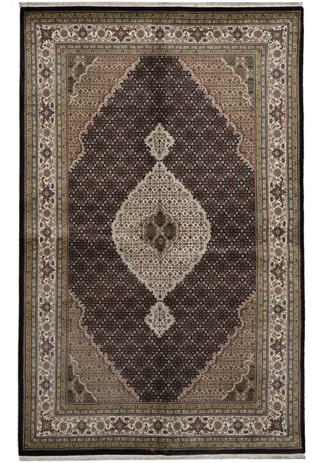 6'7" x 10' Indian Mahi rug with black field, ivory medallion and ivory floral border