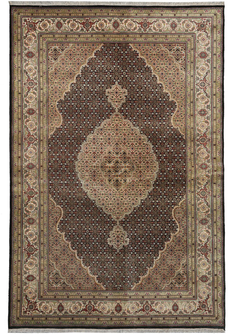 Full view of 6'6" x 9'6" Tabriz Mahi rug with black fish-pattern field and ivory medallion