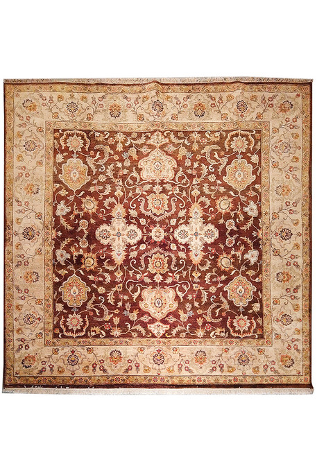 Full overhead view of the square brown Ziegler rug with wide beige floral border