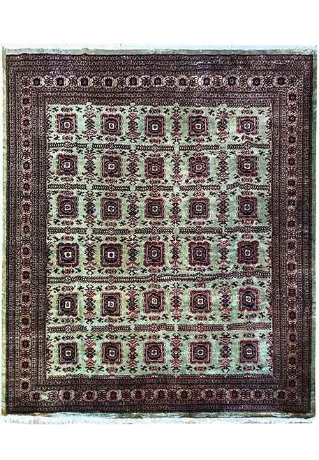 Light green Jaldar Bokhara square rug with burgundy guls, dark navy centers and ivory accents