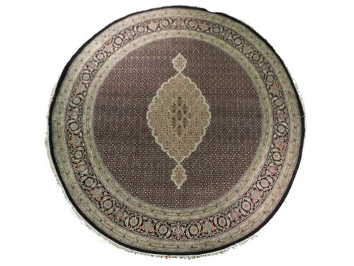 Full round Tabriz Mahi rug, dark brown field, ivory central medallion, ringed ivory and black borders