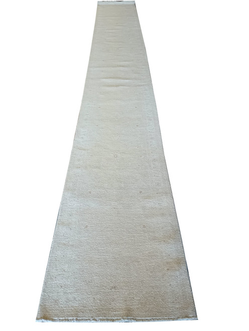 Full length of the pale ivory wool runner photographed on white, fringe at the near end