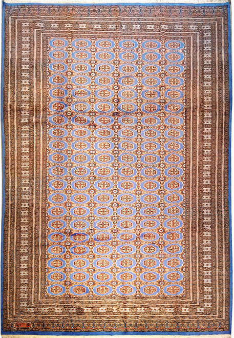 Full view of slate blue Bokara rug with repeating apricot guls and many narrow stacked borders