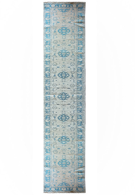 Full view of 3'1" x 19'11" Khotan design runner with blue rosette medallions on peach field