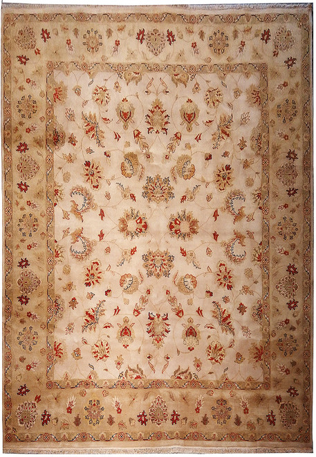 Beige Ziegler rug with sage green border and rust floral vines across the open field