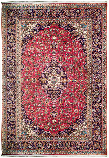 Red Persian Kashan rug with navy lobed medallion, ivory spandrels and all over floral field