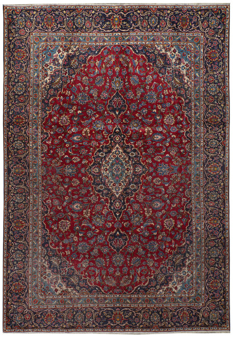 Deep red 8'10 x 12'3 Persian Kashan rug with navy floral border and ivory medallion