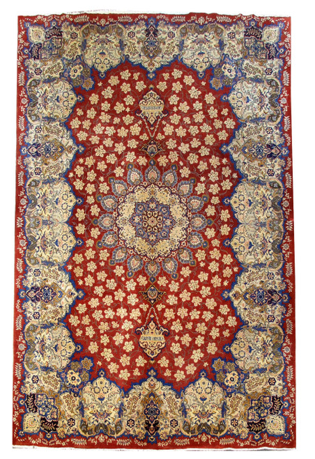 Red 7'9 x 12'1 Persian Tabriz design rug shown flat with ivory border and central medallion