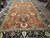 Full length view of the 14' x 22'2" oversize wool rug with navy main border