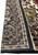 12 x 16 Oriental Heriz Rug folded to show backing and structure.