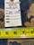 Back of the rug with hand-written tag reading rug number PIX-381 and size 8.9 x 19.6