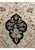 Detailed View of 12'5 x 18 Persian Tabriz Rug with Lush Floral Design on Light Background