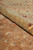 Rolled edge of the wool pile revealing medium pile height and tight selvedge finishing