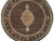 Round rug filling the frame, fish-pattern field with scrolling black border and small rosette guard stripes