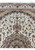 Upper field of the Tabriz rug showing pendant finial and dense allover floral vine scrollwork