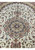 6'8" x 9'9" Tabriz medallion close view with navy core, white rosette, and sage green rings