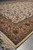 Perspective shot from a fringed corner showing border, guard stripes and part of the field